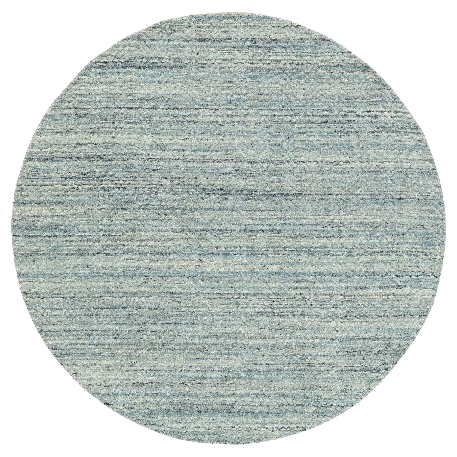 6
x6
Tapis rond en pure laine moderne, tissé à la main, vert, avec motifs variés.