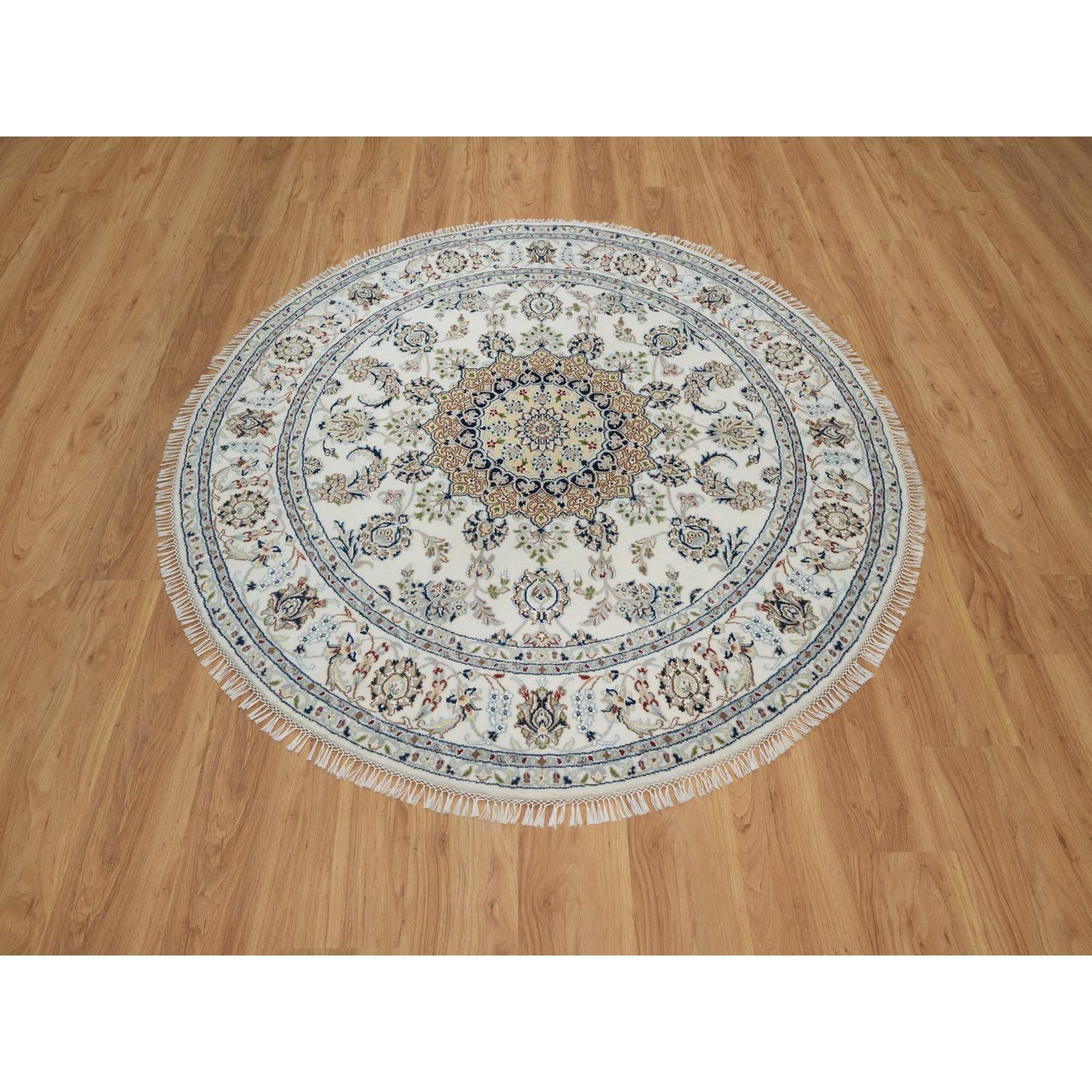 Winter White, Hand Knotted, Nain with Flower Medallion Design, Wool and Silk, 250 KPSI, Soft Pile, Round, Oriental Rug
Primary materials: Wool 
Silk
Latex: No Pile 
height: 0.25 Inches
Style: Traditional
Primary color: Ivory
Secondary colors: