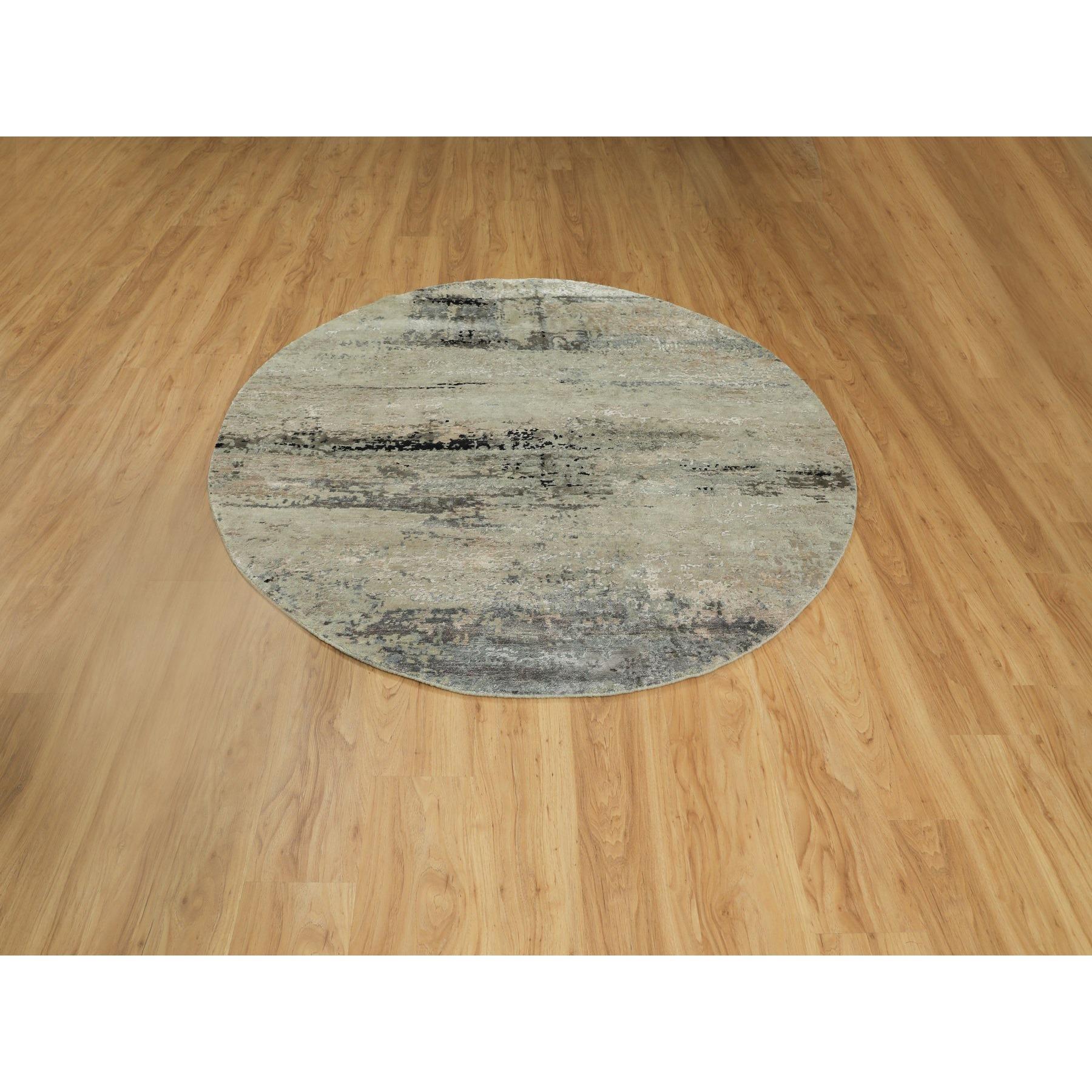 This is a truly genuine one-of-a-kind Silver Blue Wool & Silk Modern Abstract Design Hand Knotted Oriental Round Rug. It has been woven for months and months in the centuries-old Persian weaving craftsmanship techniques by expert artisans.
Primary