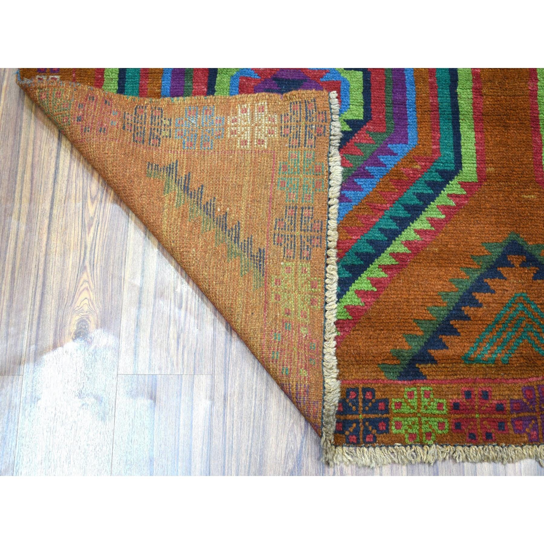 This is a truly genuine one-of-a-kind Brown Colorful Afghan Baluch Hand Knotted Geometric Design Pure Wool Oriental Rug. It has been woven for months and months in the centuries-old Persian weaving craftsmanship techniques by expert