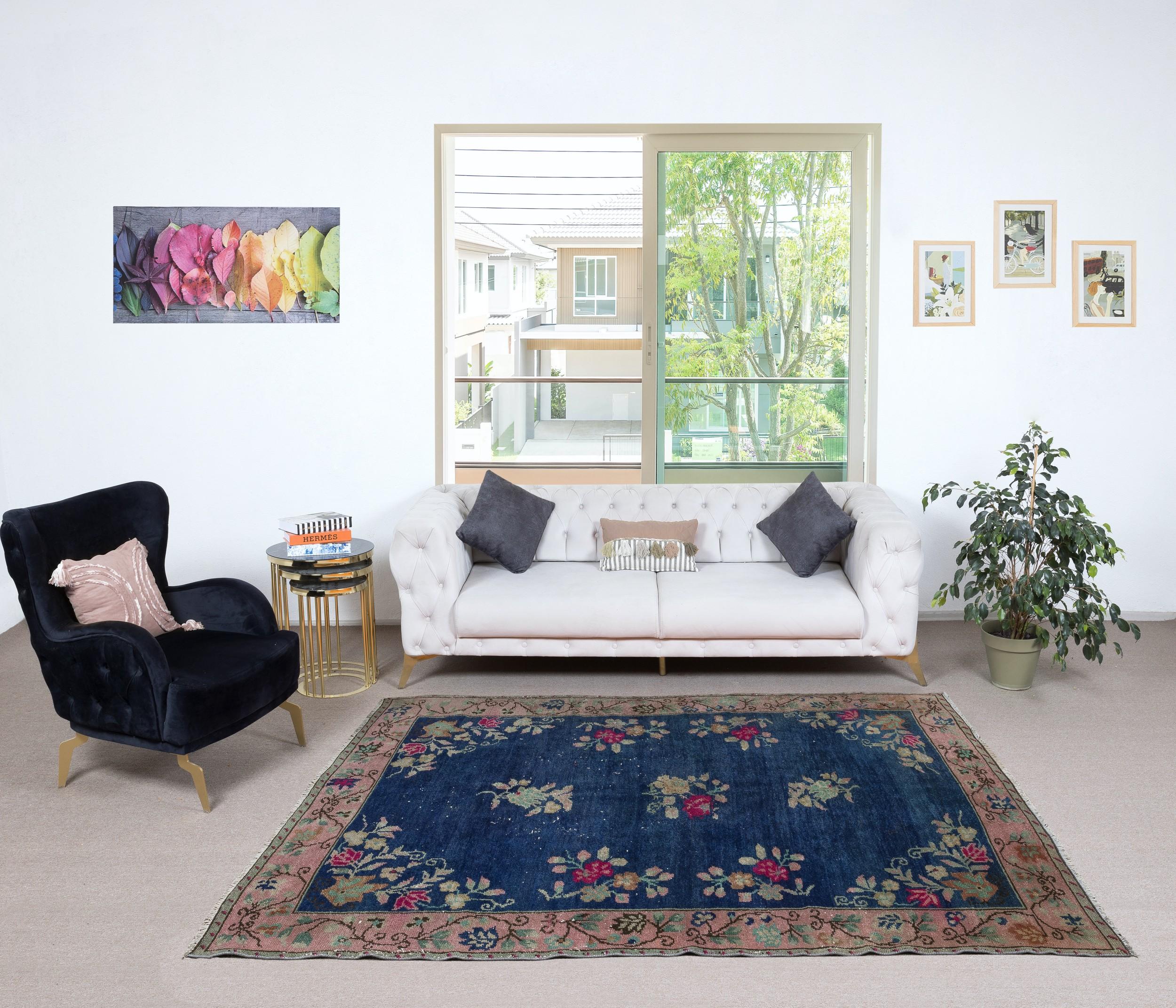 Infuse your home with the timeless beauty of this traditional vintage handmade Turkish rug, a hand-knotted masterpiece crafted from a luxurious blend of wool and cotton. Woven by skilled artisans using centuries-old techniques, this rug features