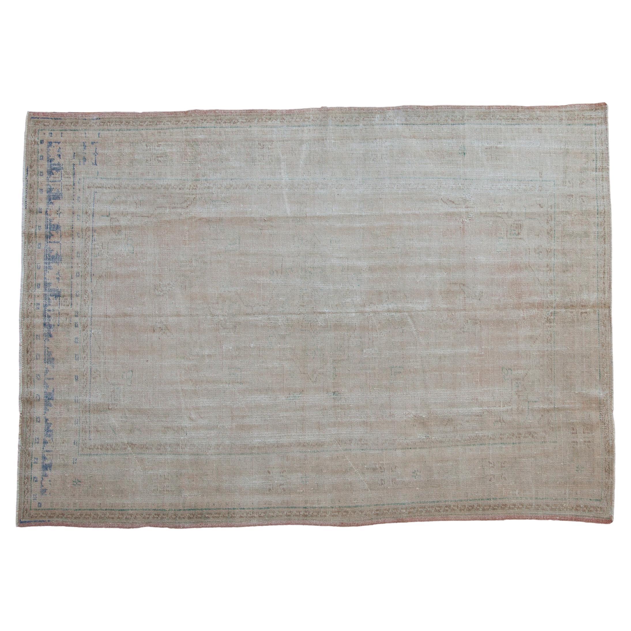 Tapis d'Oushak vintage vieilli