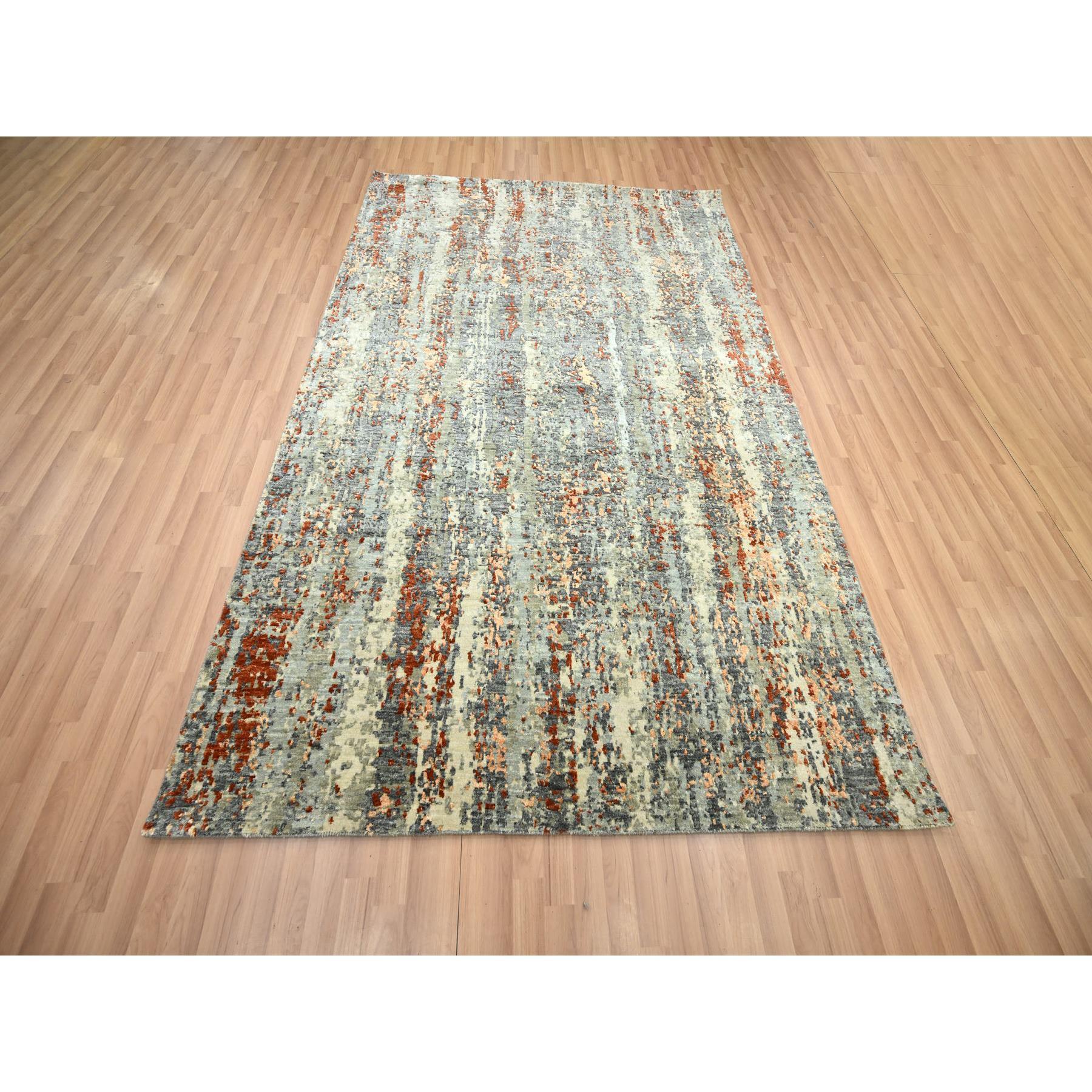 Shades of Gray with Rust, Abstract with Galaxy Design, Persian Knot, Pure Wool, Hand Knotted, Densely Woven, Oriental Rug
Primary materials: Wool
Latex: No Pile 
height: 0.25 Inches
Style: Contemporary
Primary color: Grey
Secondary colors: Orange,
