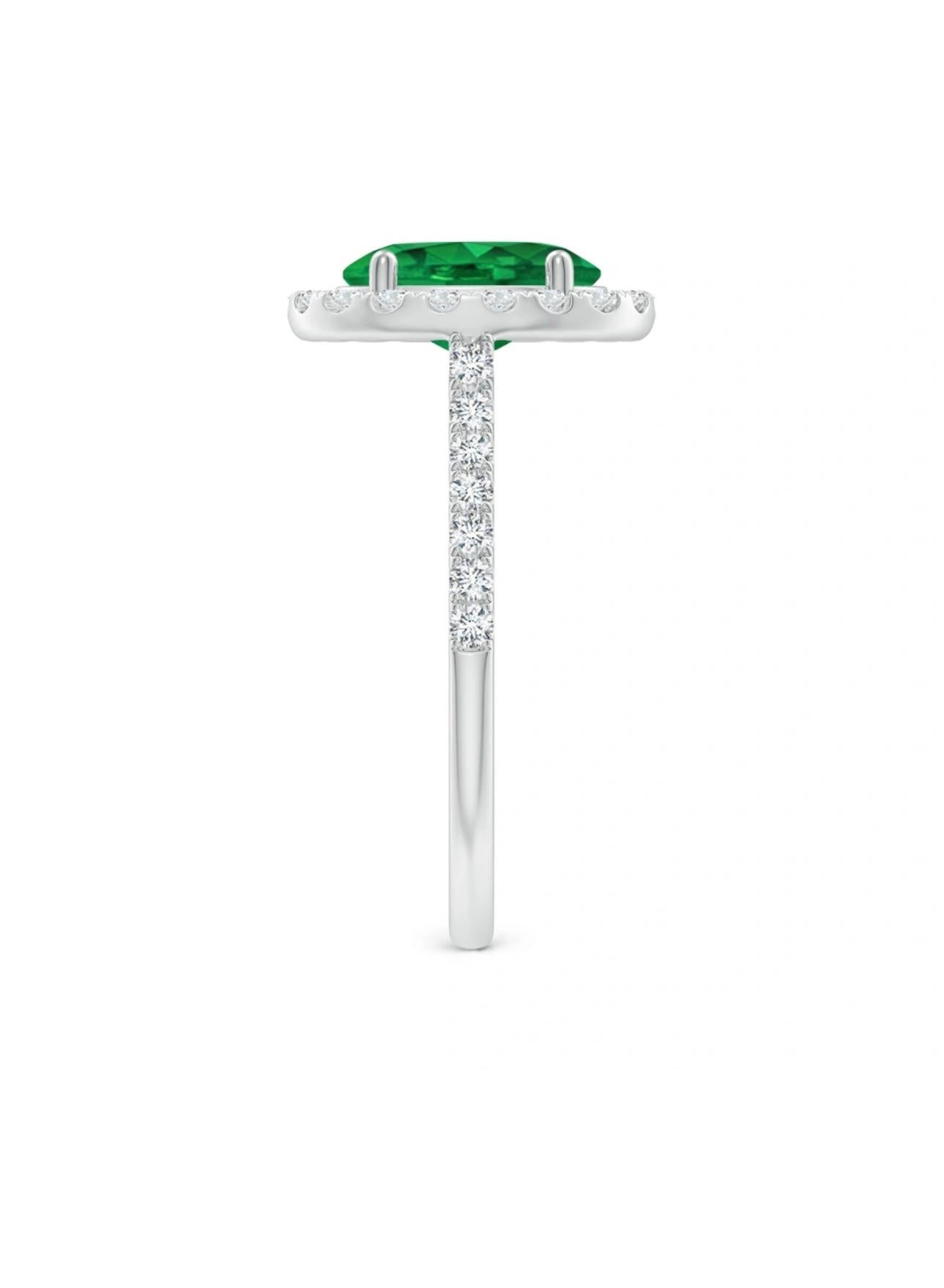 6x8mm Oval Cut Natural Emerald & 1 Ct Natural Diamond Halo Engagement Ring size 4.5 in 14 K white Gold
Introducing a truly stunning piece, behold the 1.25 Carat Oval Natural Zambian Emerald & 1 ct Diamond Ring in exquisite 14 Karat White Gold. This
