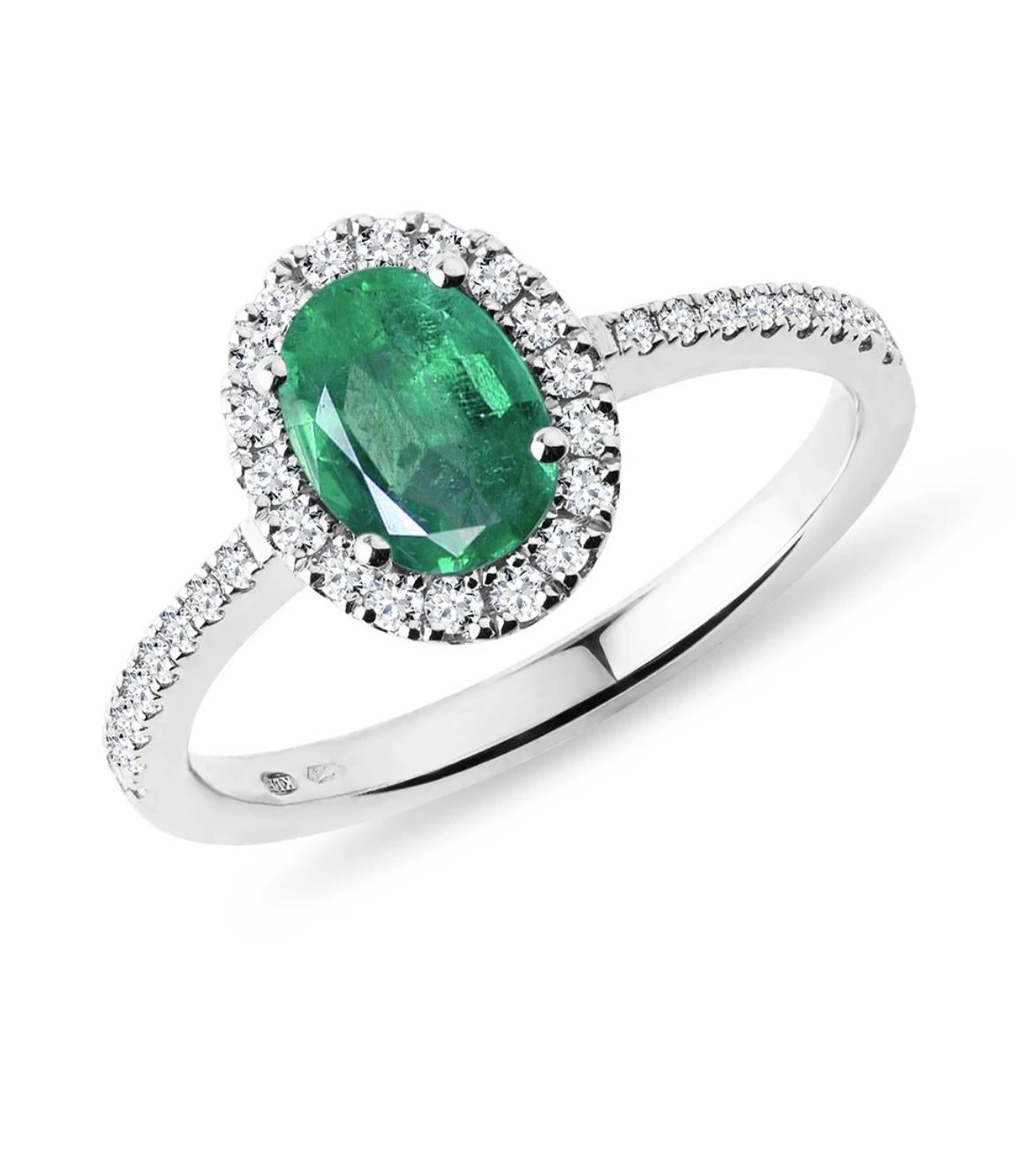 6x8mm Oval Cut Natural Emerald & 1 Ct Natural Diamond Halo Engagement Ring size 6 in 14 K white Gold
Introducing a truly stunning piece, behold the 1.25 Carat Oval Natural Zambian Emerald & 1 ct Diamond Ring in exquisite 14 Karat White Gold. This