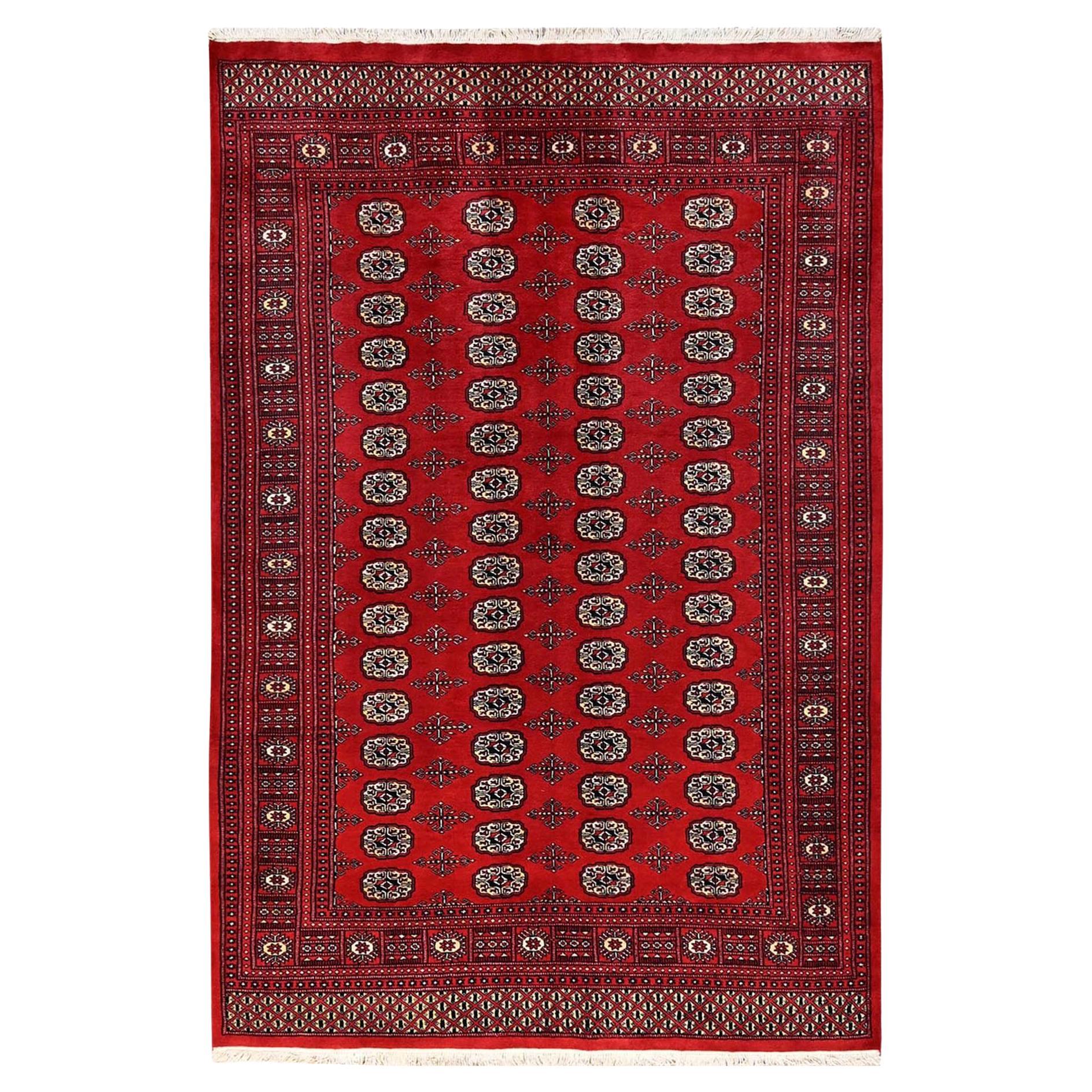 6
x9
 Brick Red Hand Knotted Princess Bokara Tribal Medallions Soft Wool Rug For Sale