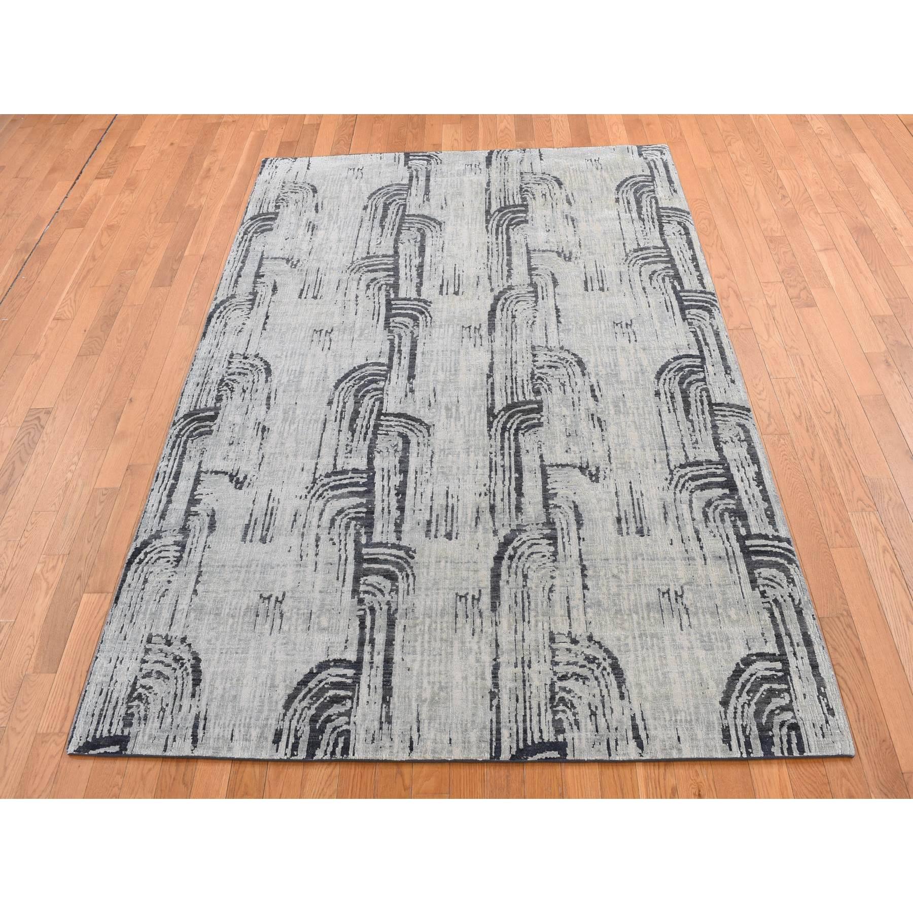 Cloud Gray, THE CANE, Pure Silk with Textured Wool, Hand Knotted, Oriental Rug
Primary materials: Wool & Silk
Latex: No Pile 
height: 0.25 Inches
Style: Transitional
Primary color: Grey
Secondary colors: Black
Pattern: Oriental