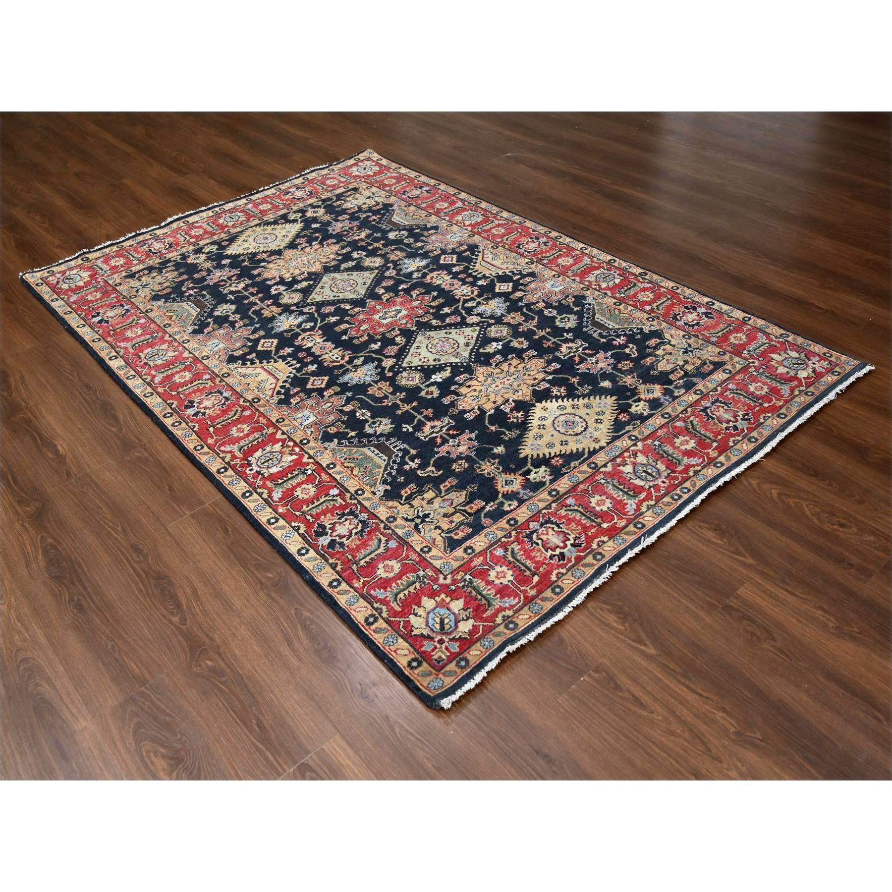This is a truly genuine one-of-a-kind Hand Knotted Karajeh Design with Tribal Medallions, Pure Wool, Oriental Rug. It has been Knotted for months and months in the centuries-old weaving craftsmanship techniques by expert artisans.
Primary materials: