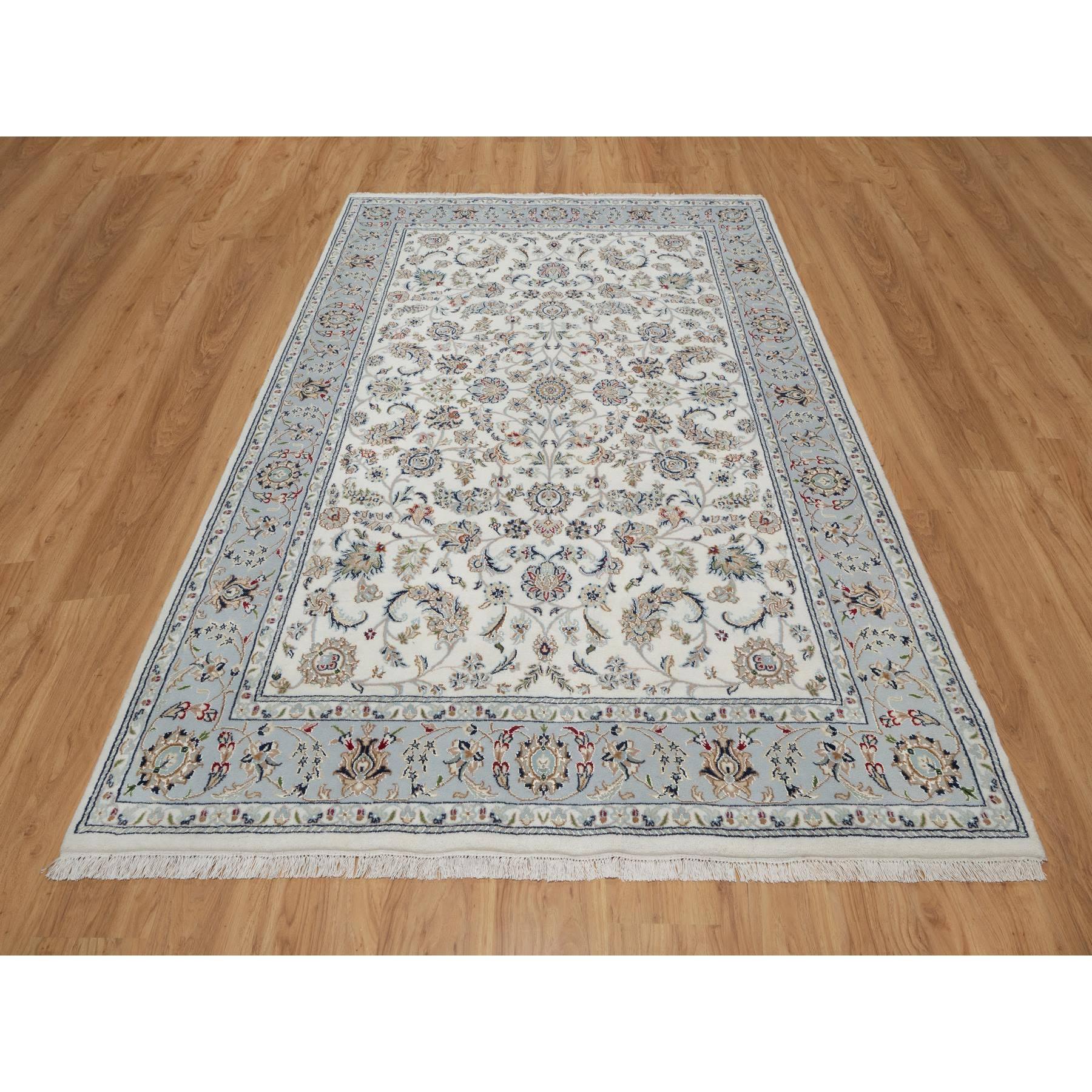 Spring White, Hand Knotted, Nain with All Over Flower Design, 250 KPSI, Wool and Silk, Oriental Rug
Primary materials: Wool & Silk
Latex: No Pile 
height: 0.25 Inches
Style: Traditional
Primary color: Ivory
Secondary colors: Red, Navy Blue, Green,