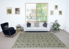 6x9.2 Ft Handmade Turkish Wool Area Rug with Floral Design and Green Background