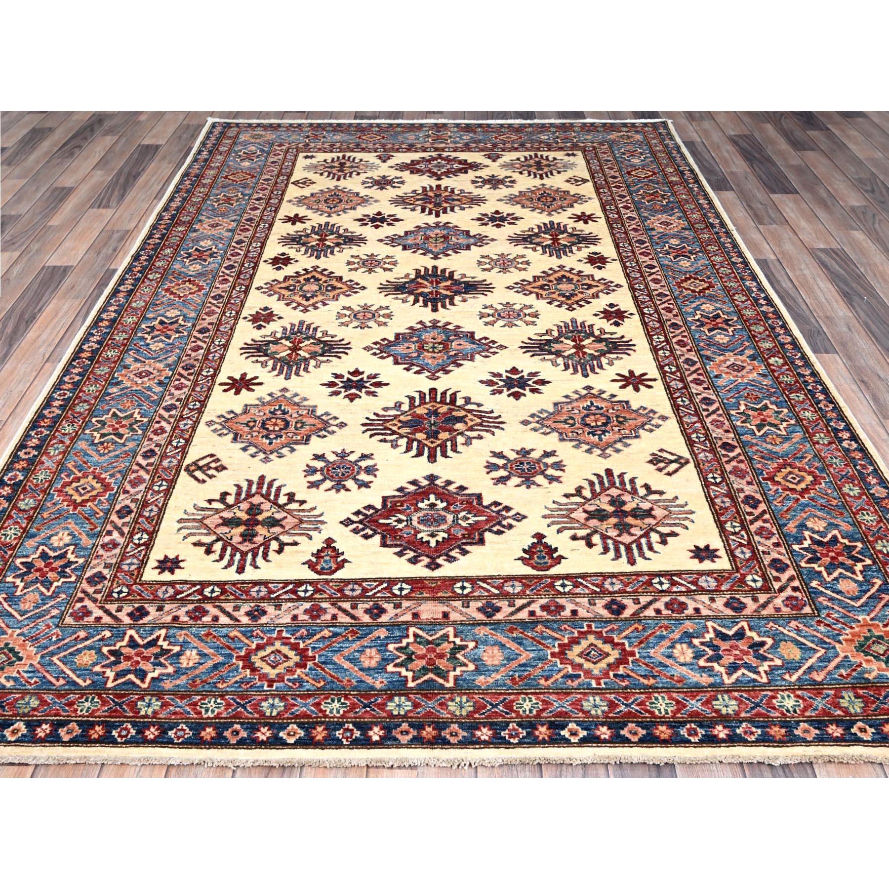 This is a truly genuine one-of-a-kind Afghan Super Kazak, Hand Knotted, Pure Wool, Oriental Rug. It has been Knotted for months and months in the centuries-old weaving craftsmanship techniques by expert artisans.
Primary materials: Wool
Latex: No