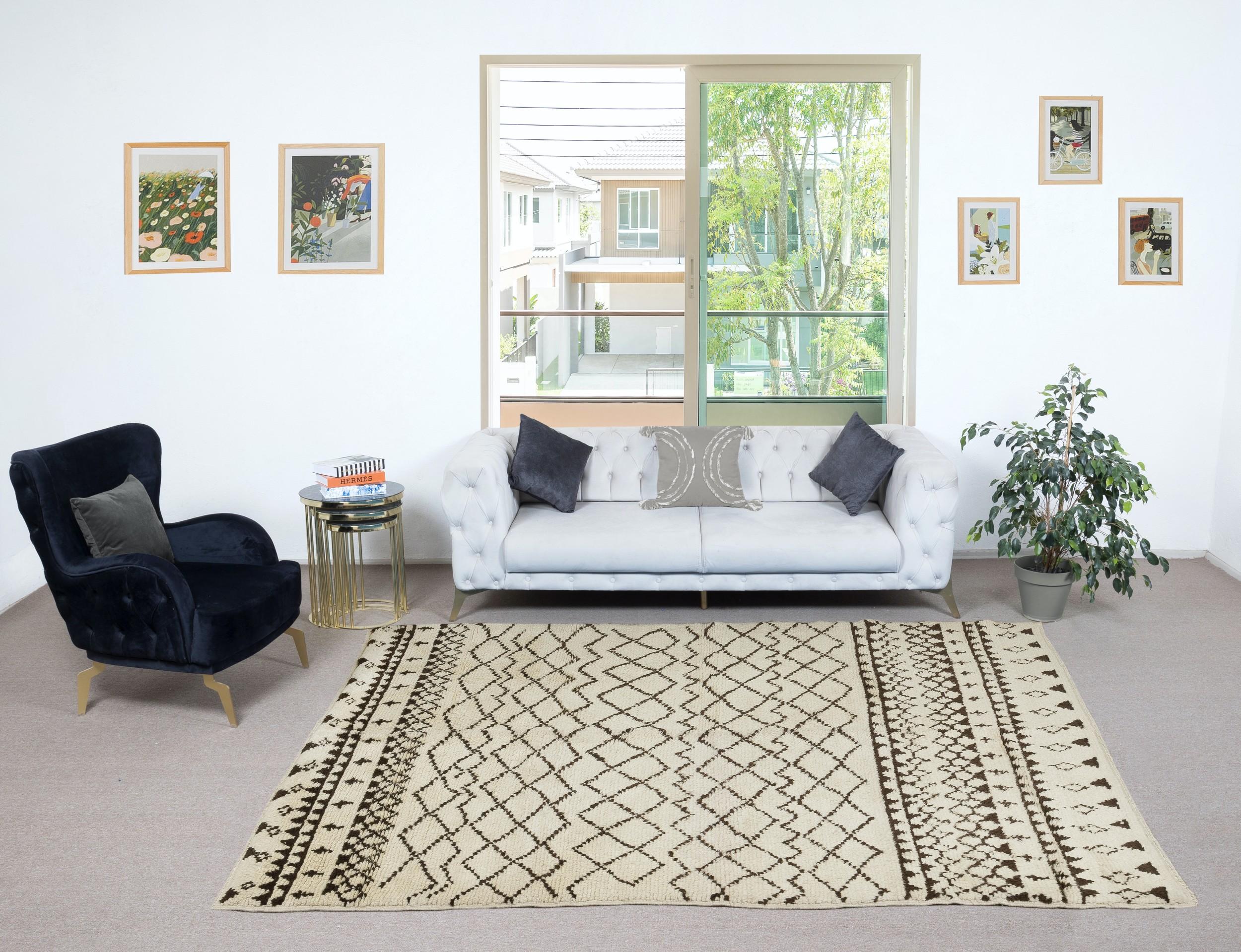 Elevate your living space with the exquisite charm of this new modern hand-knotted Moroccan berber beni ourain rug, crafted with precision and care from 100% wool. Combining the allure of Moroccan design with contemporary sensibilities, this rug is