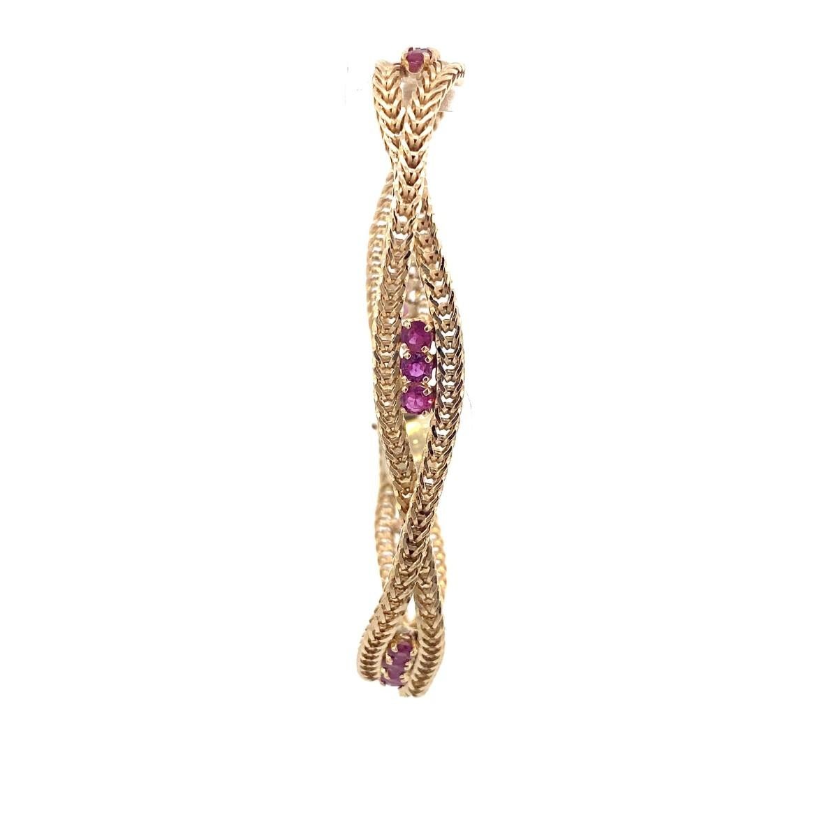 Inventory number: EL1077077
Elevate your wrist with the captivating allure of the 14K Yellow Gold Round Synthetic Ruby Bracelet, weighing 16.08g and spanning a length of 7 inches. This exquisite piece seamlessly combines classic design with modern