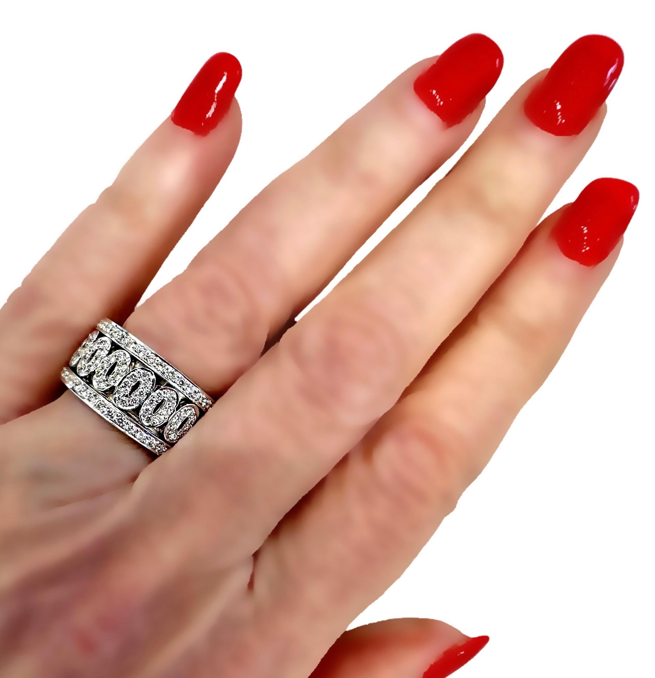 7/16 Inch Wide 18K White Gold Diamond Band Ring with Oval Motifs In Excellent Condition For Sale In Palm Beach, FL