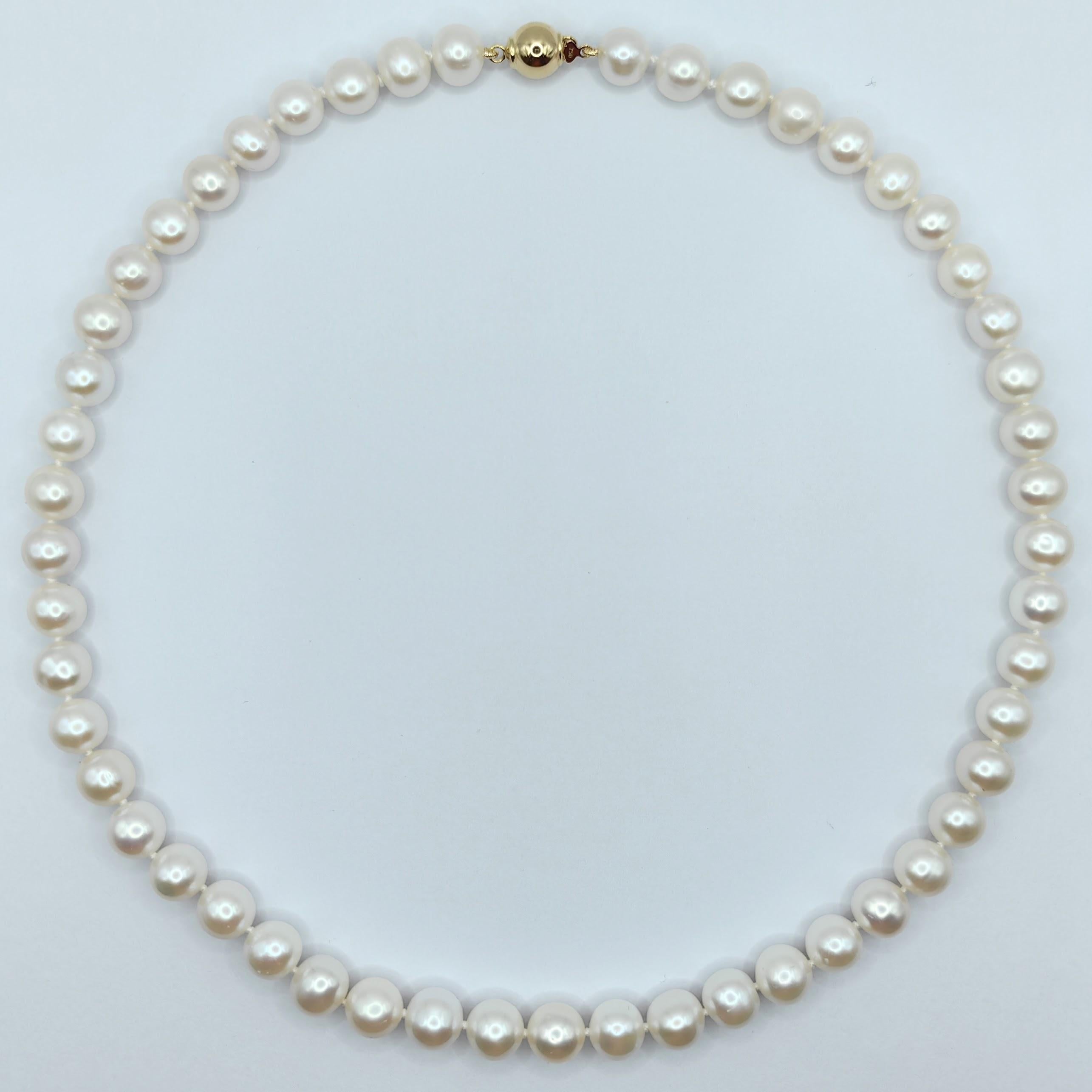 Introducing our exquisite 18-inch 7-8mm White Round Pearl Necklace with an 18K Gold Clasp, a timeless and elegant accessory that exudes sophistication and grace. Crafted with meticulous attention to detail, this hand-knotted necklace showcases the