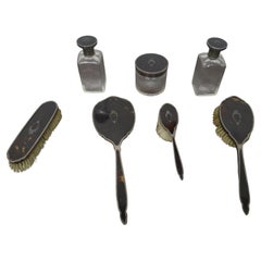 7 Toilet accessories in 925 sterling silver and tortoiseshell, early 20th century