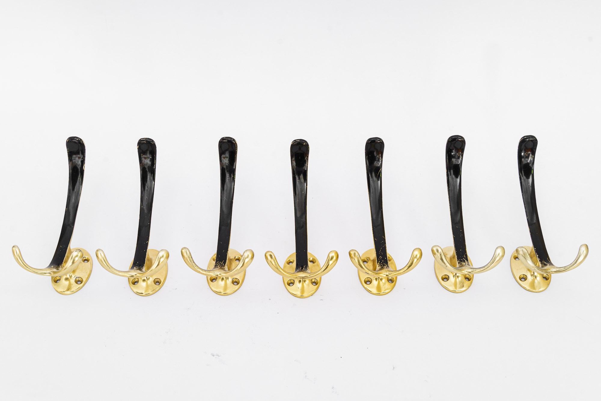 7 aluminum wall hooks black and gold lacquered vienna around 1960s
Original condition.