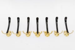 7 Aluminum Wall Hooks Black and Gold Lacquered Vienna Around 1960s