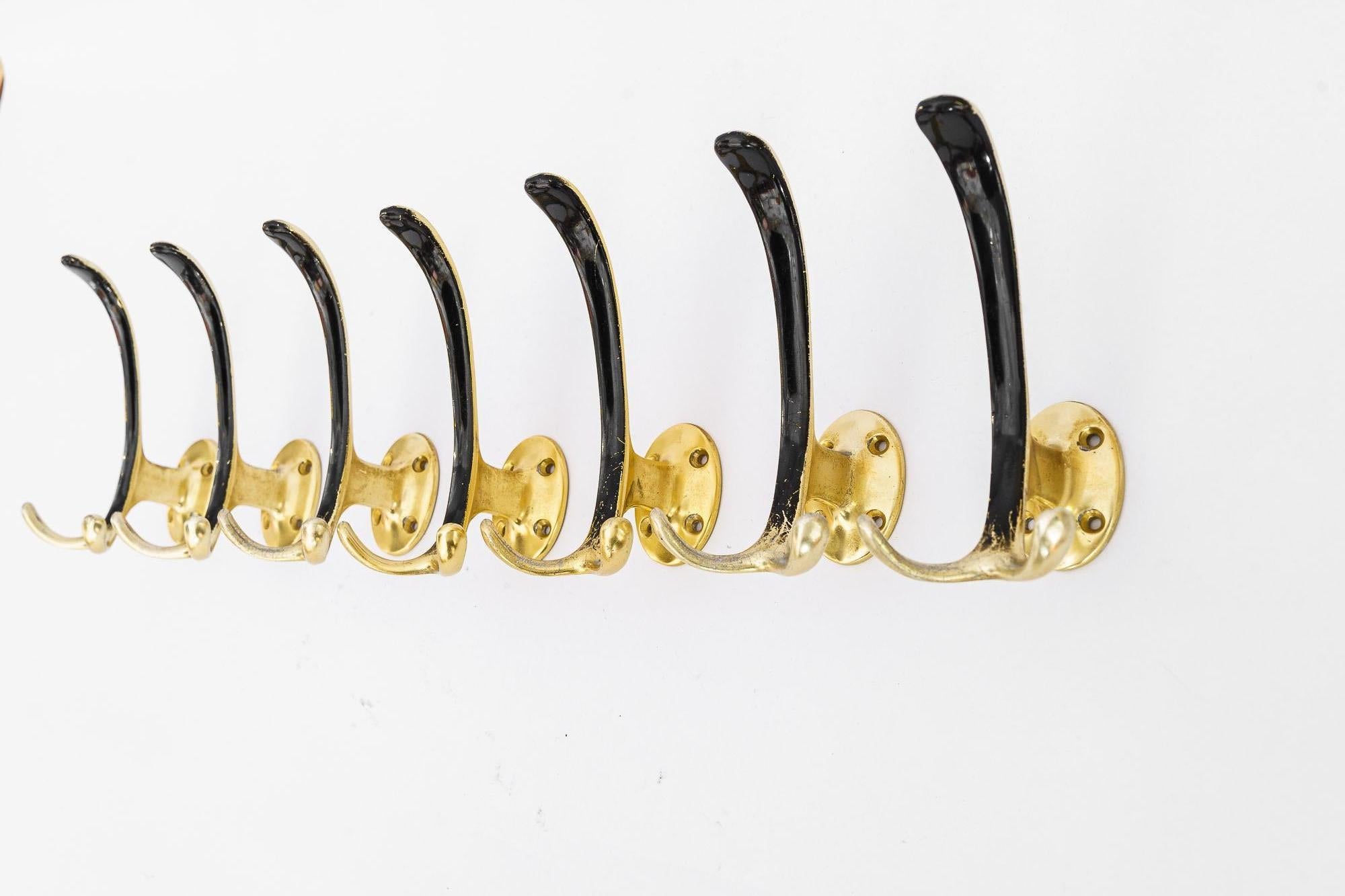 Mid-Century Modern 7 Aluminum Wall Hooks Black and Gold Lacquered Vienna Around 1960s For Sale