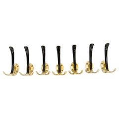 7 Aluminum Wall Hooks Black and Gold Lacquered Vienna Around 1960s