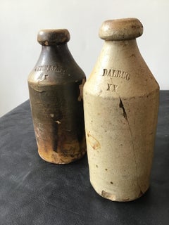 7 Antique Stoneware Gin Bottles