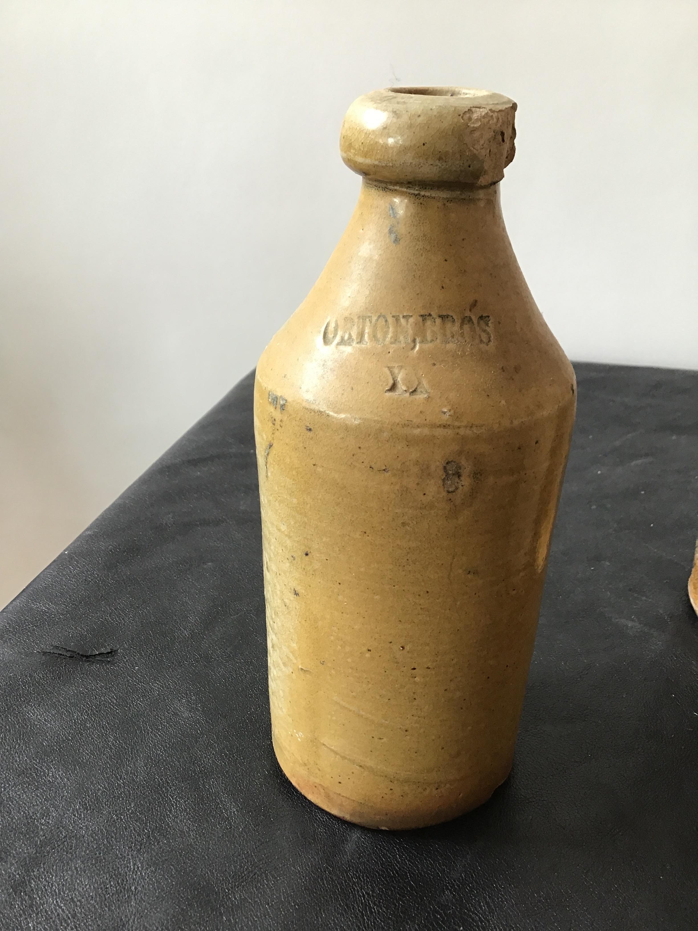 Mid-19th Century 7 Antique Stoneware Gin Bottles