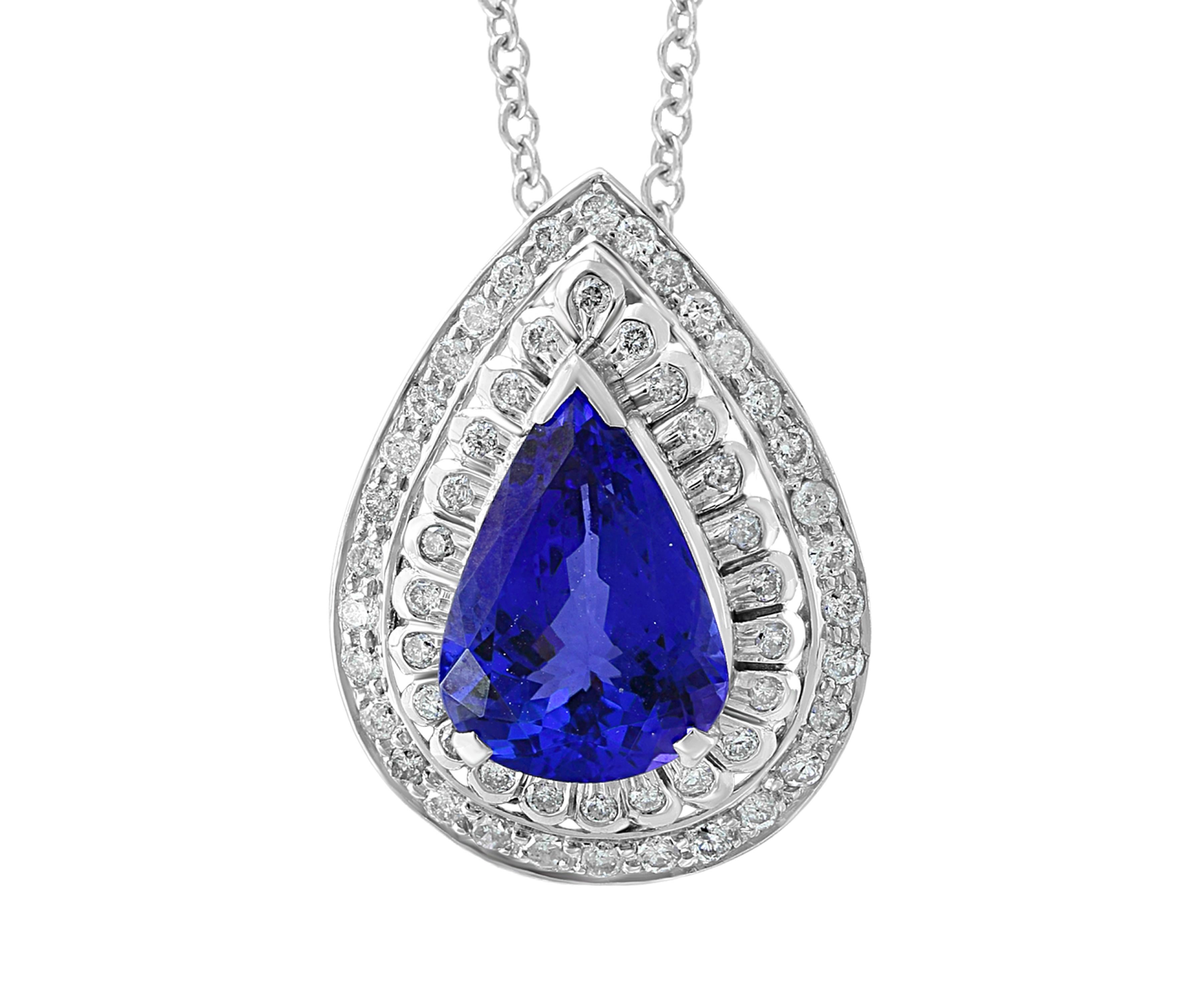7 carats of fine  quality of  Tanzanite pendant surrounded by brilliant round  cut Diamonds all mounted in 18 karat White  gold. Weight of the necklace is 9 Grams . 
Tanzanite Weight  7 Carats
Diamond Weight 2.6 Carats
18 K gold Weight  9 Grams
Very