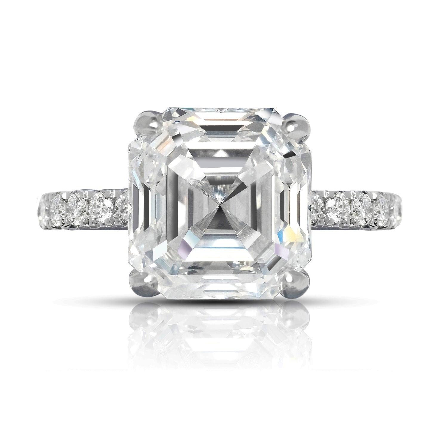 ADDISON DIAMOND ENGAGEMENT PLATINUM RING BY MIKE NEKTA
GIA CERTIFIED

Center Diamond:
Carat Weight: 6.2 Carats
Color: G*
Clarity: VVS1
Style:  ASSCHER CUT/ EMERALD- SQUARE MODIFIED BRILLIANT
Approximate Measurements: 10.4 x 9.9 x 6.7 mm
* This