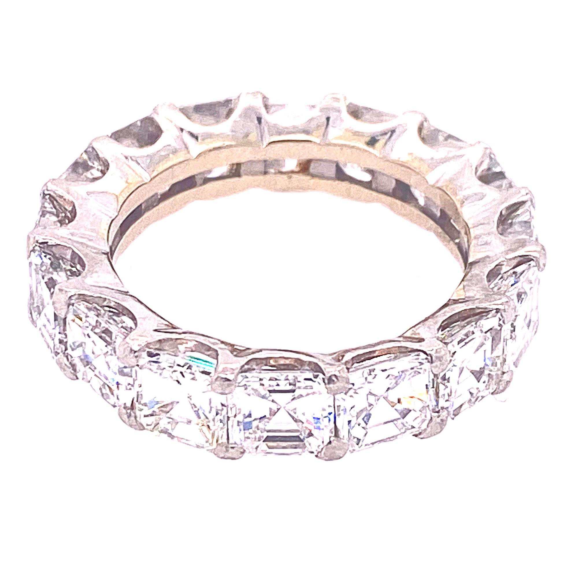 Stunning diamond eternity band featuring 16 asscher cut matched diamonds that weigh 7.00 carat total weight. The diamonds are all graded F-G color and VS clarity. The band will fit finger size 5.5-6. 