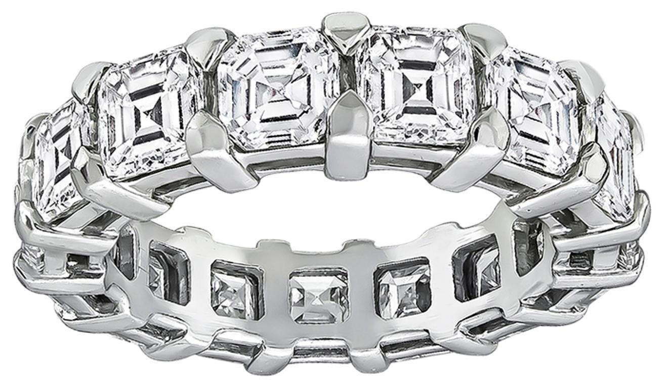 Made of platinum, this stunning band is set with sparkling asscher cut diamonds that weigh 7.00ct. graded H color with VS clarity. It measures 5mm in width and weighs 8.7 grams. The band is size 6 1/2.

Inventory #57867NKWS