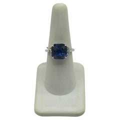 7 Carat Blue Sapphire Radiant and White Diamond 3 Stone Ring in 18K