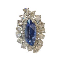 7 Carat Blue Sapphire Ring Set in 18 Karat Gold with Diamonds