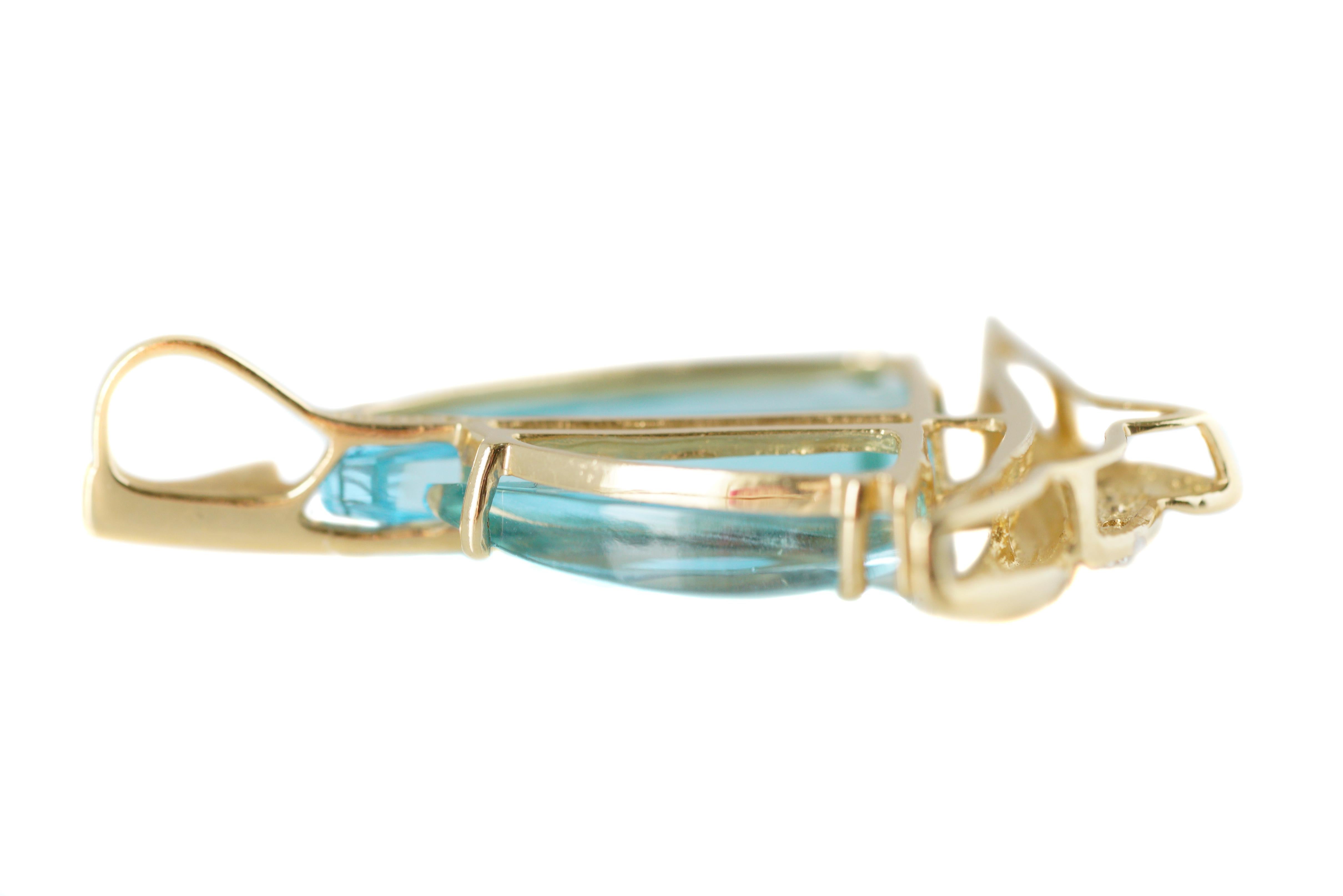 Retro 7 Carat Blue Topaz and 14 Karat Yellow Gold Sail Boat Pendant