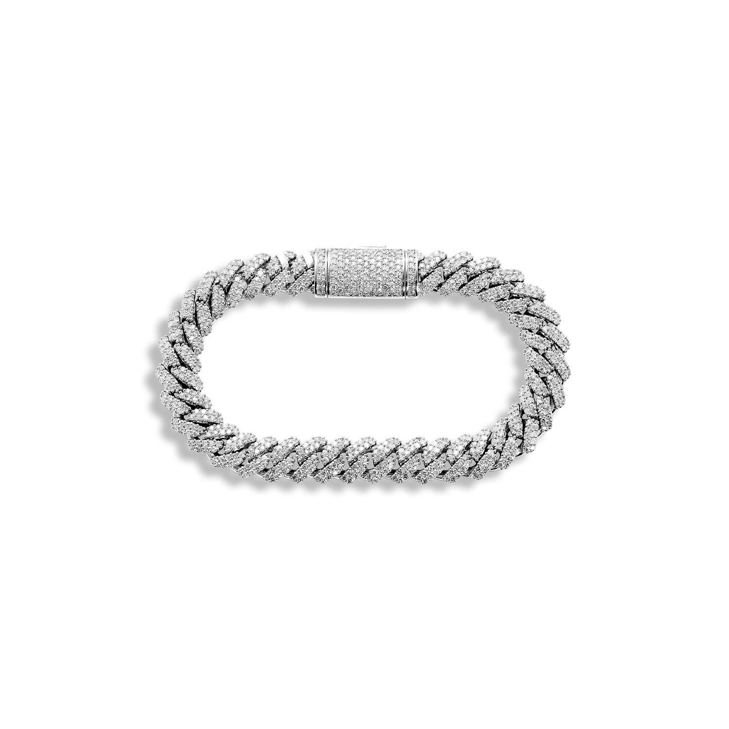 The COPA Men’s 7 Carat Diamond Cuban Link Chain Bracelet features round brilliants weighing a total of approximately 7 carats, set in 14K White Gold.

Meticulously handcrafted to perfection in our own factory in the New York City Diamond District,
