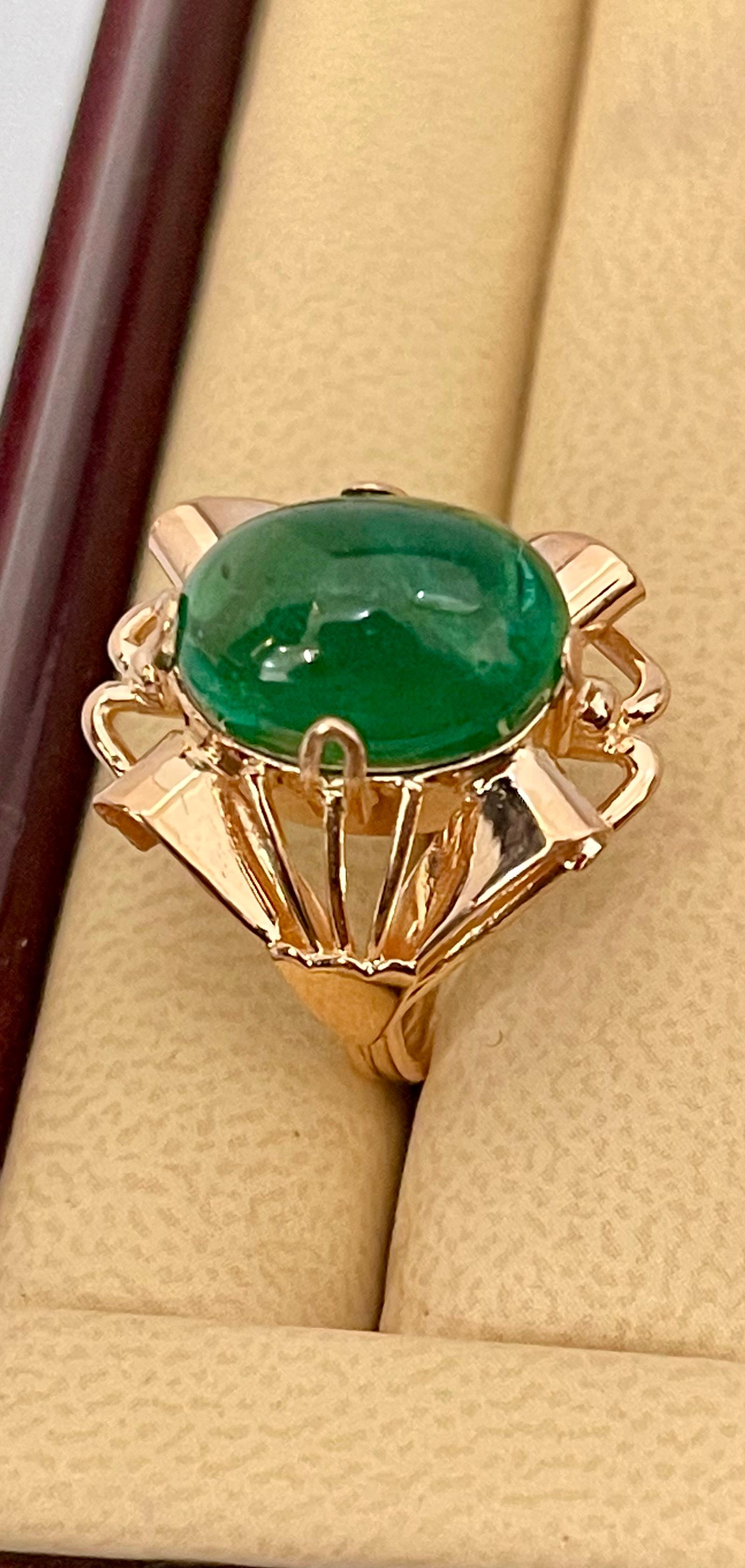 A classic, Cocktail ring 
Large size Emerald  cabochon approximately 7 Carat Emerald , Estate with no color enhancement. 
Gold: 14 Karat Rose   gold ,
Weight: 6.4  gram with stone 
simple ring , no bling 
Emerald: 7 Carat 
Origin : Zambia
Color:
