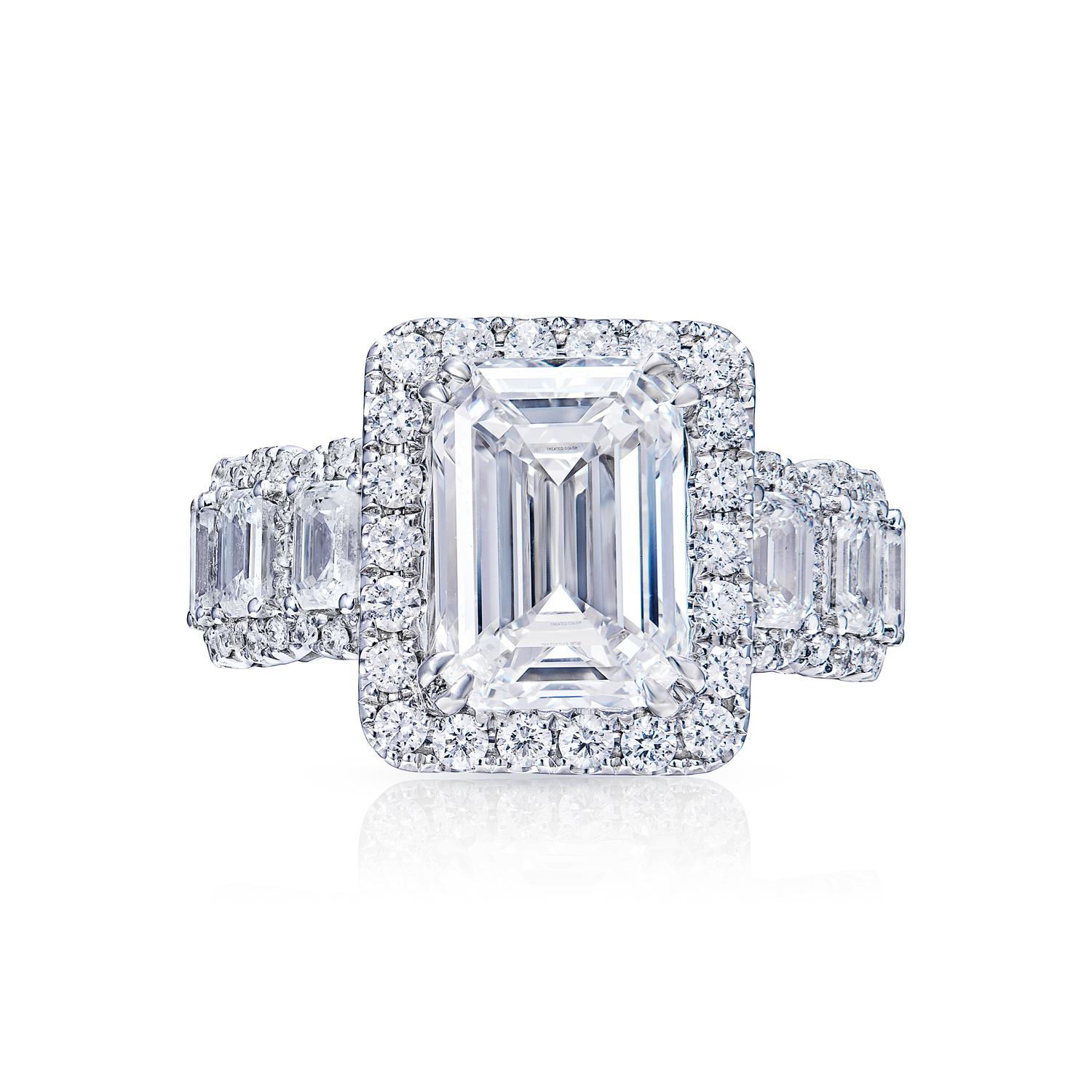 Earth Mined Diamond:

Carat Weight: 4.01 Carats
Color: E*
Clarity: IF
Style: Emerald Cut
*This Diamond has been treated by one or more processes to change its color

Ring:
Total Carats: 6.76 Carats
Diamond: 2.75 Carats
Shape: Combine Mix Shape