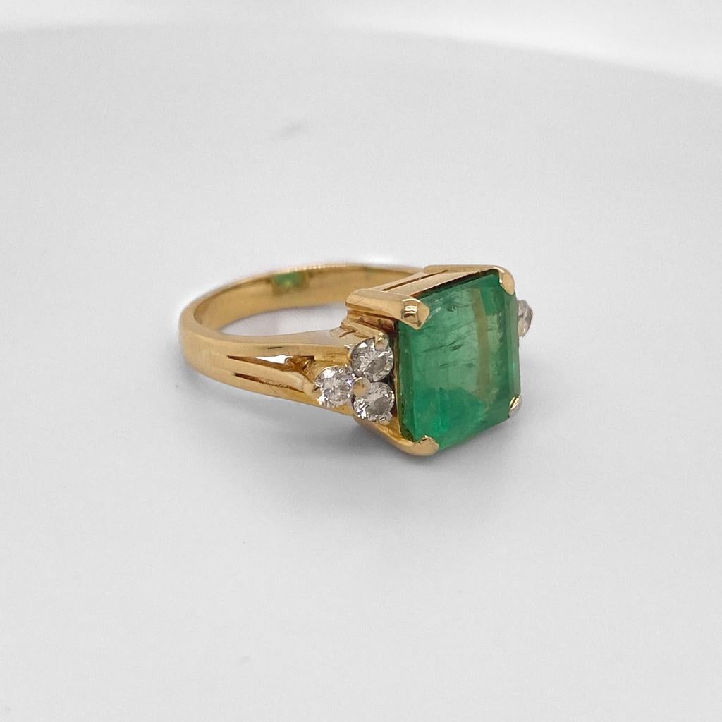 Emerald Cut 7 Carat Emerald with Diamonds in 18K Yellow Gold, 7.5 Carats Total For Sale