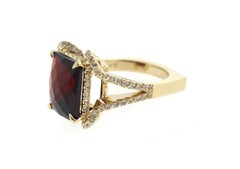 7 Carat Garnet and Sapphire Ring with European Shank in 18 Karat Yellow Gold