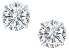 Matched Pair of Round Cut Diamonds set in solid Platinum