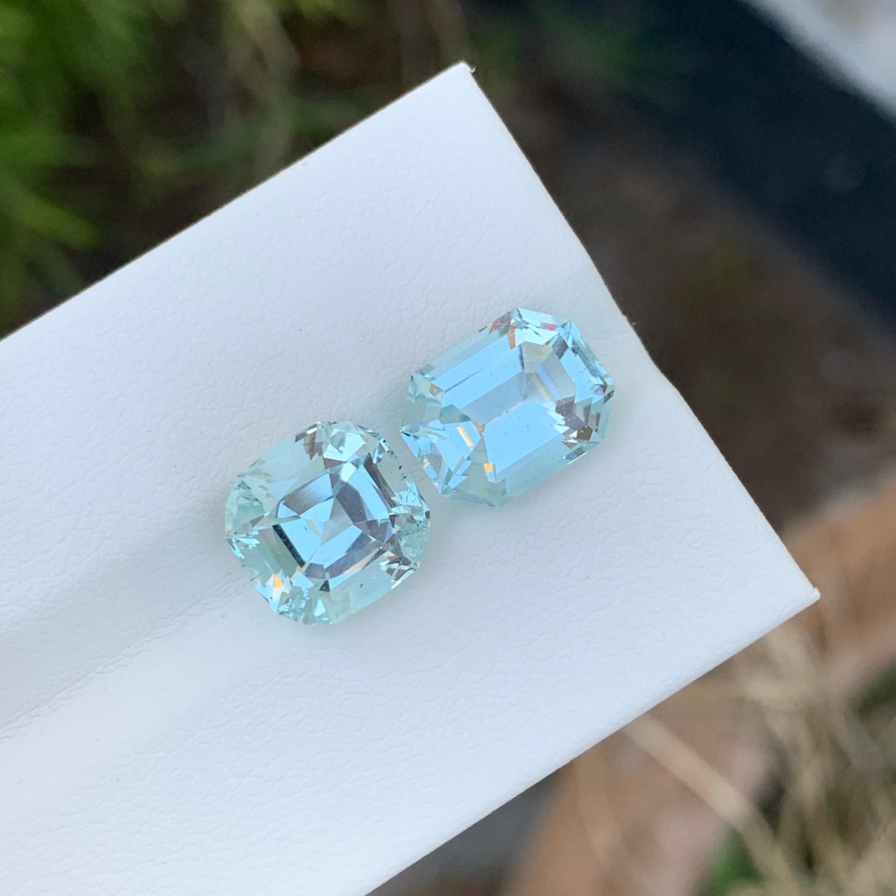 Loose Aquamarine Duo 
Weight: 7 Carat
Dimension: 10.6 x 8.2 x 5.9 Mm And 
                    9.6 x 9.2 x 6.9 Mm
Colour : Pale Blue
Origin: Shigar Valley, Pakistan
Treatment: Non
Certificate : On Demand
Shape: Cushion 

Aquamarine is a captivating