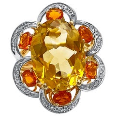 7 Carat Orangy Yellow Citrine and Diamond 14 Karat Yellow Gold Cocktail Ring