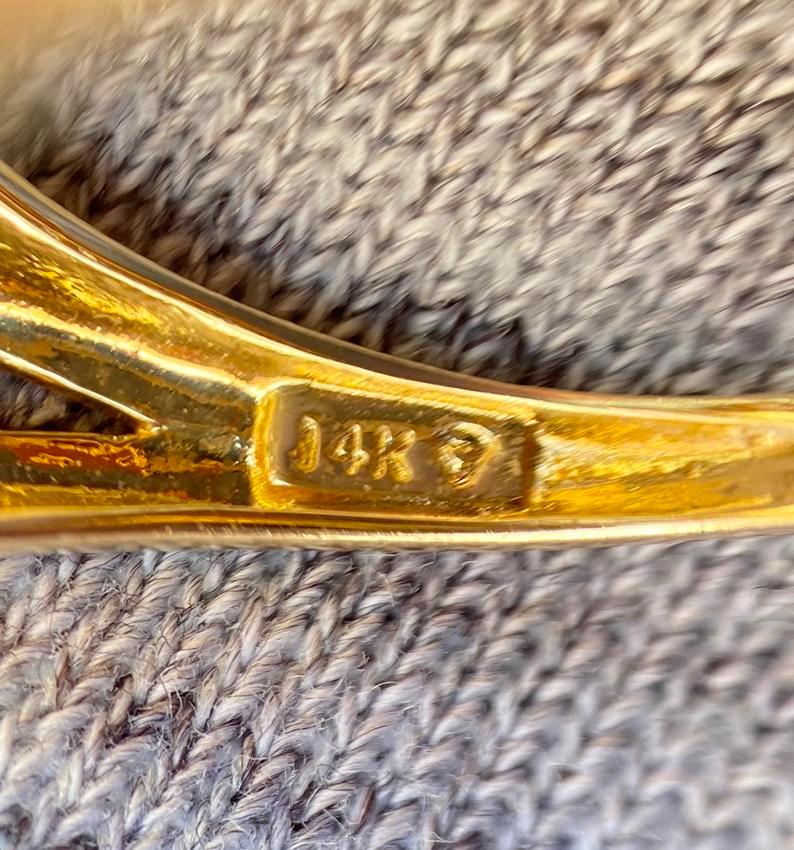 Oval Cut 7 Carat Orangy Yellow Citrine and Diamond 14 Karat Yellow Gold Cocktail Ring