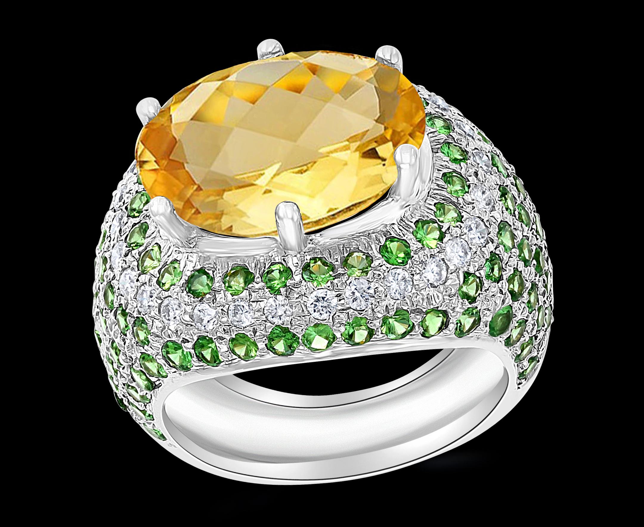 Approximately 7 Carat Oval Citrine Tsavorite And Diamond Ring In 18 Karat White Gold , Estate
This is a ring which has a  approximately 7 carat of high quality Citrine  , the main stone is surrounded by brilliant cut diamonds and round