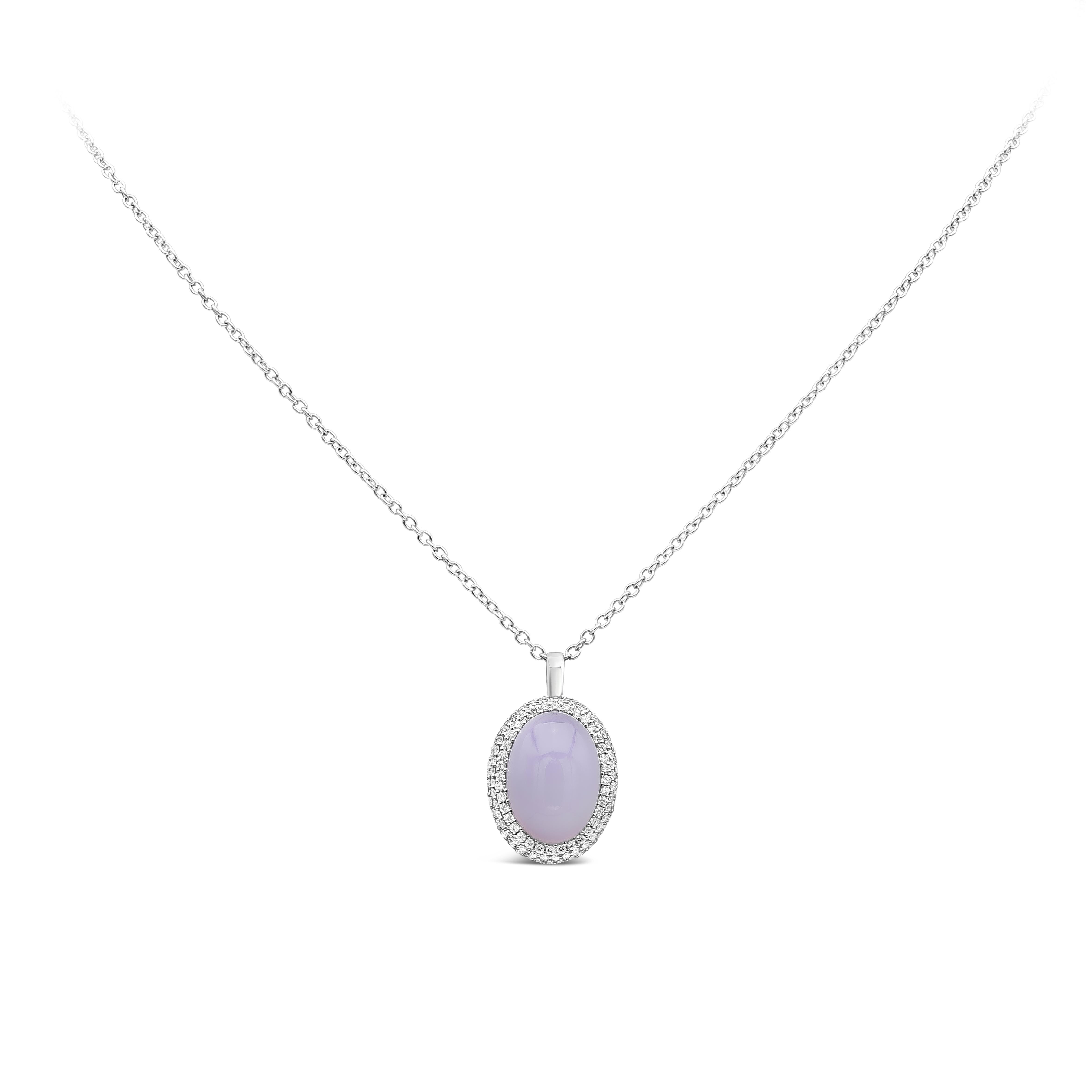 A fashionable pendant necklace showcasing an oval lavender chalcedony weighing 7 carat. Center stone is accented with bright round diamonds weighing 0.79 carats total, F color and VS clarity.
Made in 18 karats white gold.

Roman Malakov is a custom