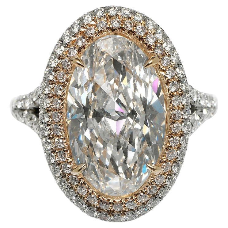 Anillo de compromiso de diamantes de 7 quilates talla oval Pink Halo Platino Certificado GIA E VVS1
