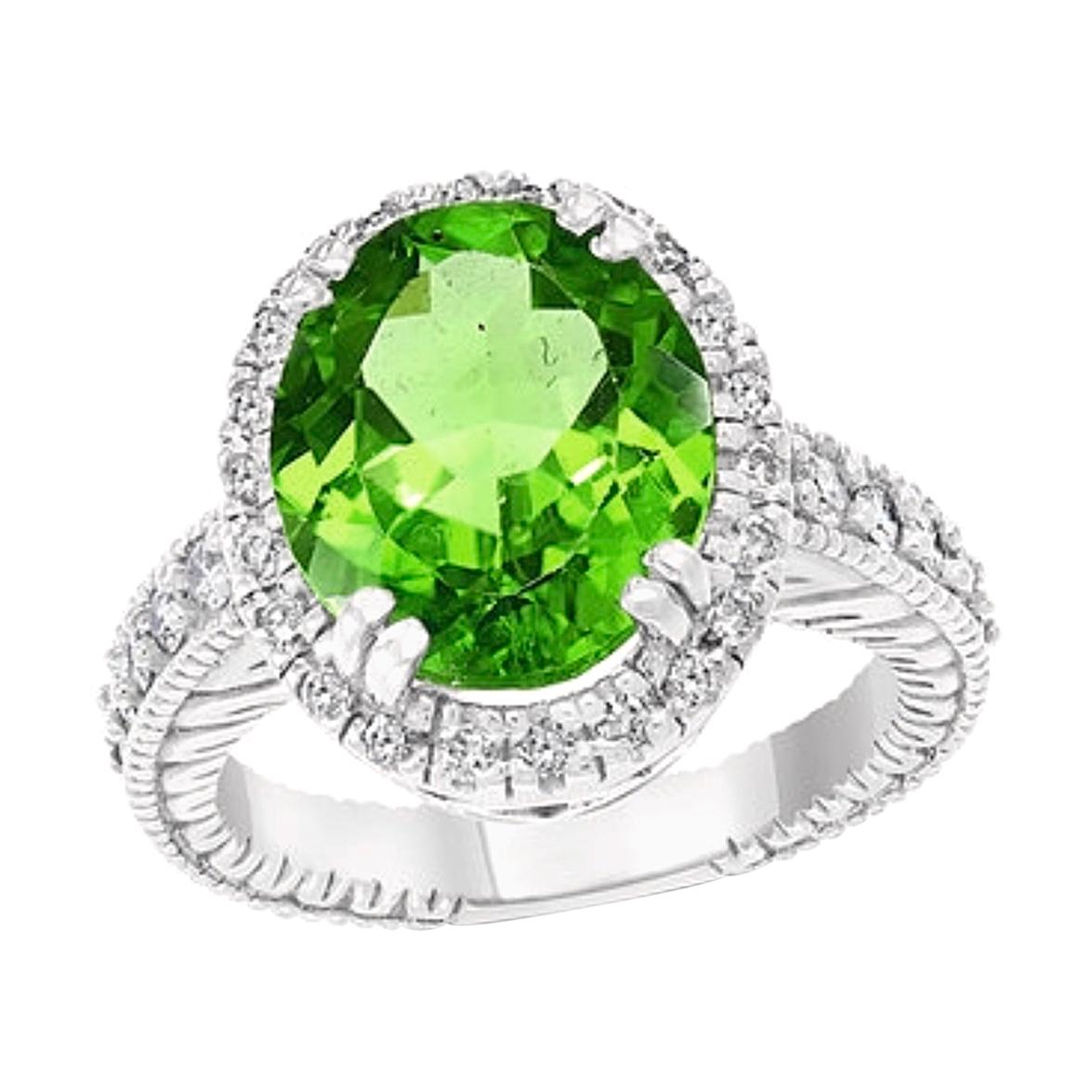 7 Carat Oval Peridot and 1.2 Carat Diamonds 14 Karat White Gold Cocktail Ring For Sale