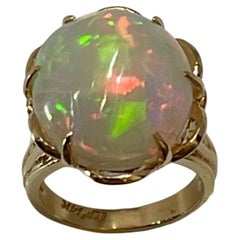 7 Carat Oval Shape Opal Cocktail Ring 14 Karat Yellow Gold, Estate