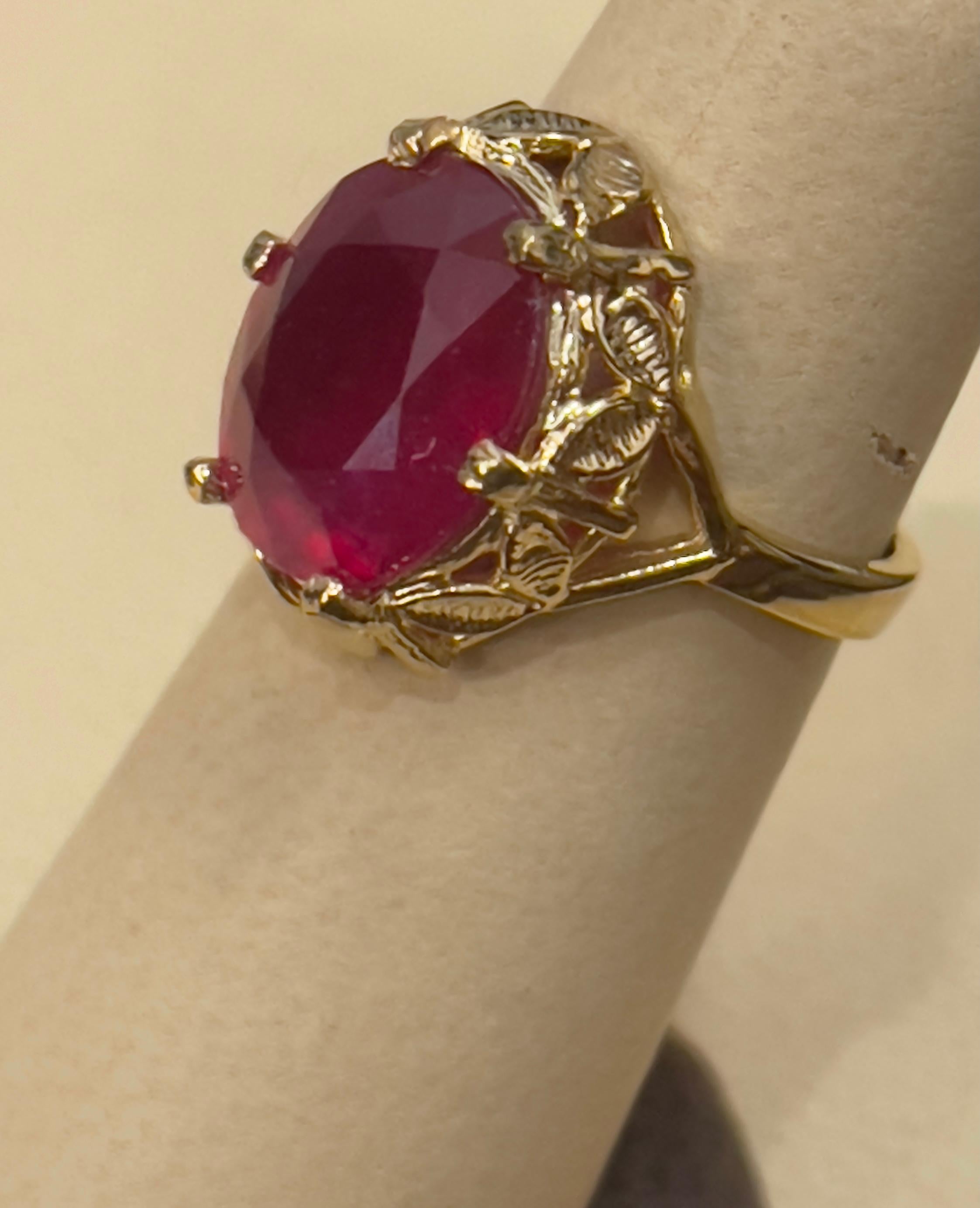 7 Karat Ovalförmiger behandelter Rubin 14 Karat Gelbgold Ring 1