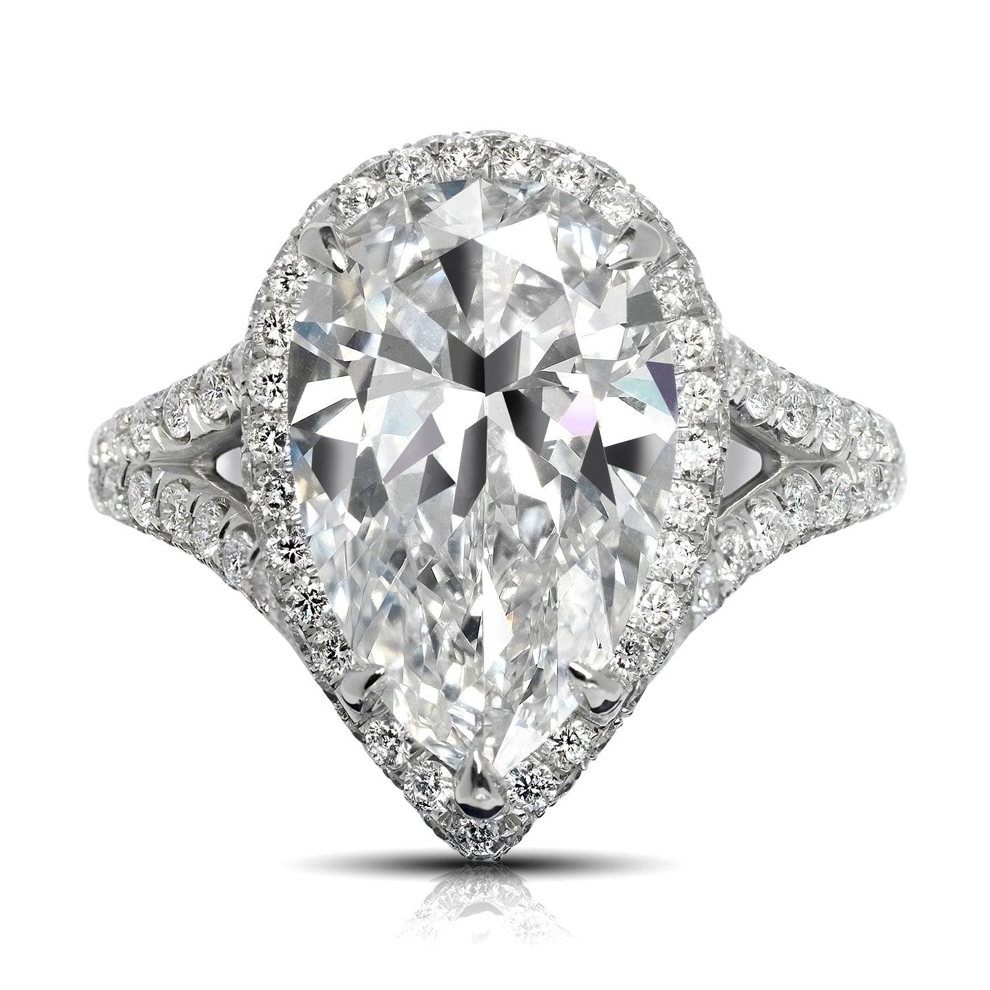 NATALIE 5 CARAT PEAR DIAMOND ENGAGEMENT PLATINUM RING BY MIKE NEKTA

Center Diamond:
Carat Weight: 5 Carats
Color: E*
Clarity: INTERNALLY FLAWLESS -IF
Style:  PEAR SHAPE
Approximate Measurements: 14.8 x 9.5 x 5.8 mm
* This diamond has been treated