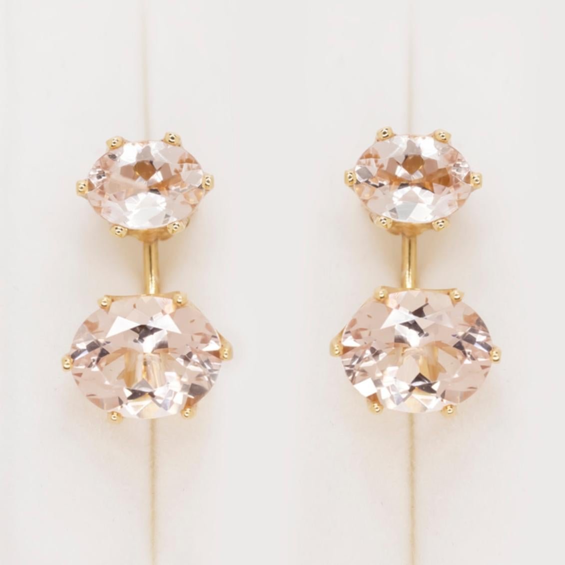 chic pair of earrings features natural pink morganites set in an elegant stud and jacket design. Totaling 7 carats, the morganites offer an eye catching substantial look! The morganites are a beautiful blush color reminiscent of rosé, and their well